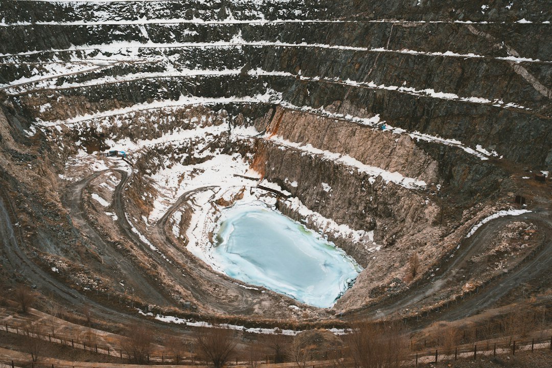 Aerial view of a large open-pit mine illustrating drone surveying and mapping