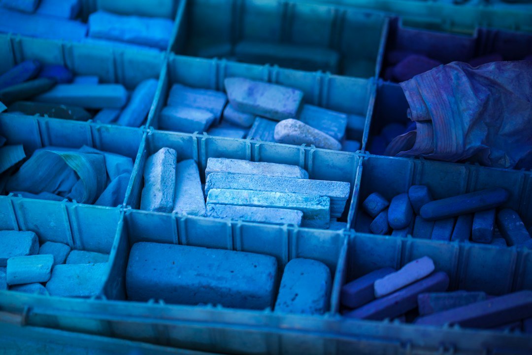 Organized geological rock samples illustrating the review of gold exploration results