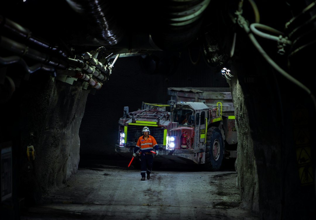 Underground mining tunnel with modern equipment and lighting