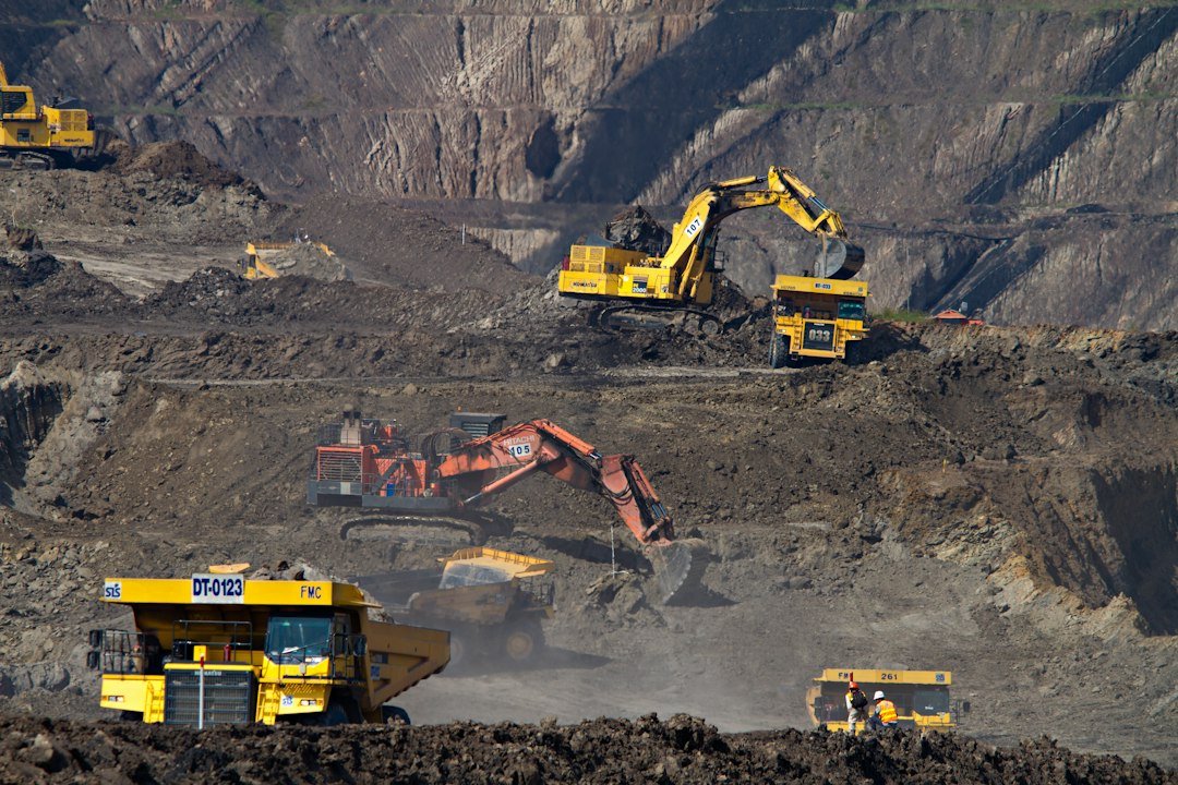 Open-pit mining operation illustrating drilling and blasting activities