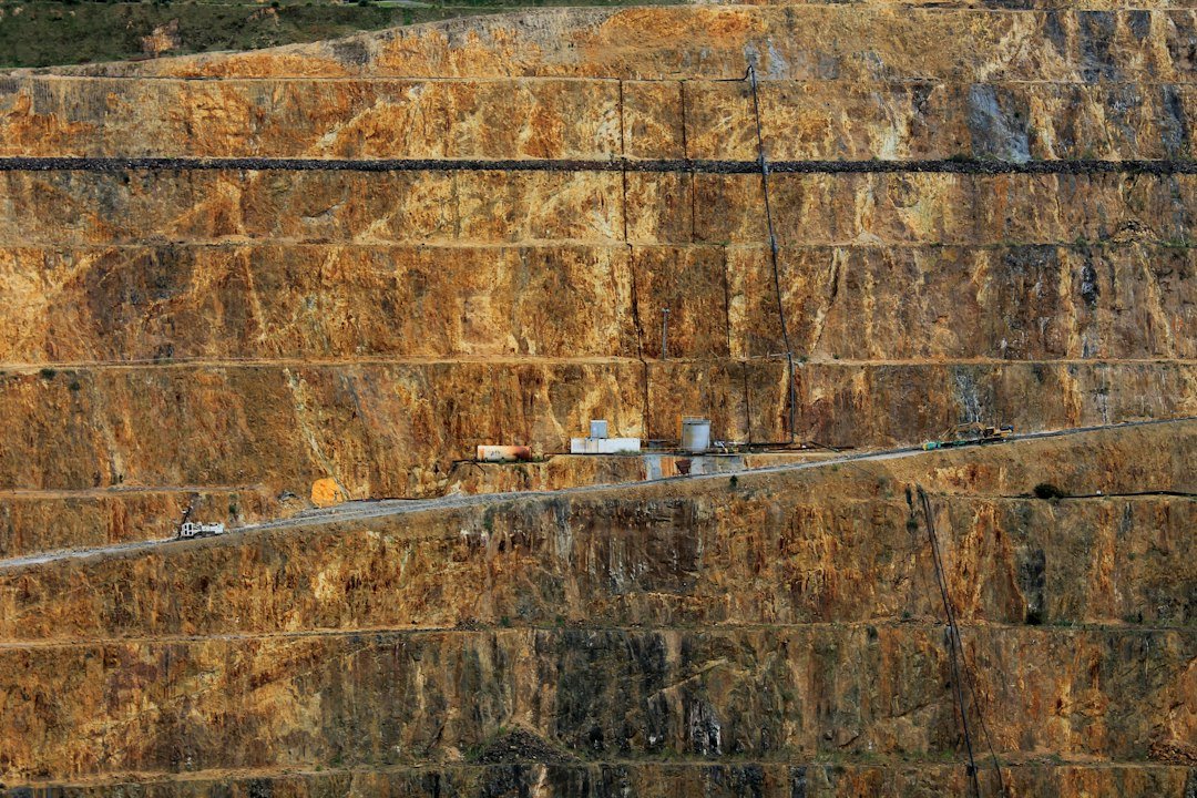 Winding haul road through a large open-pit mine